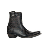 Black cowboy boot with intricate designs on a white background