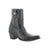 Black cowboy boot with intricate designs on a white background