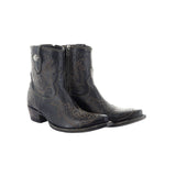 Pair of black cowboy boots with intricate designs on a white background