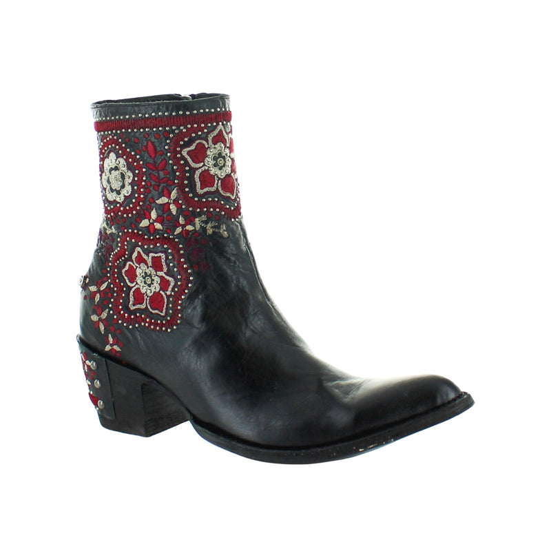 A black boot with embroidered details around the toe and heel