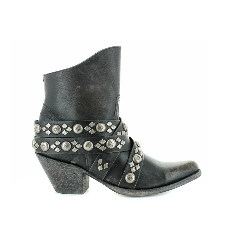 Black leather boot with embellished straps and a studs.