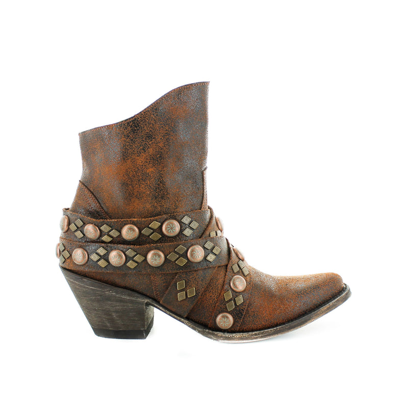 A brown/brass/bronze colored boot with a high heel and round toe, featuring buckle details and a studded pattern on the side.