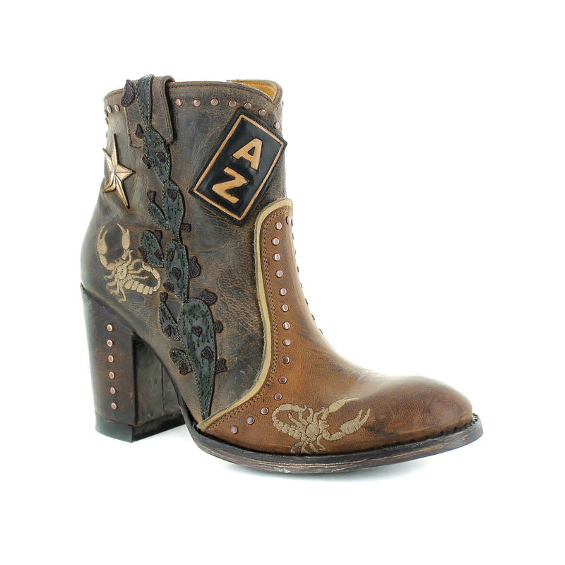 A brown leather boot with embroidered details including a cactus and the letter 'Az'.