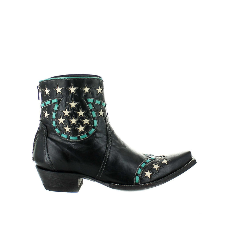 A black leather women's boot with decorative braiding and a star design on the toe and heel, with a black sole.