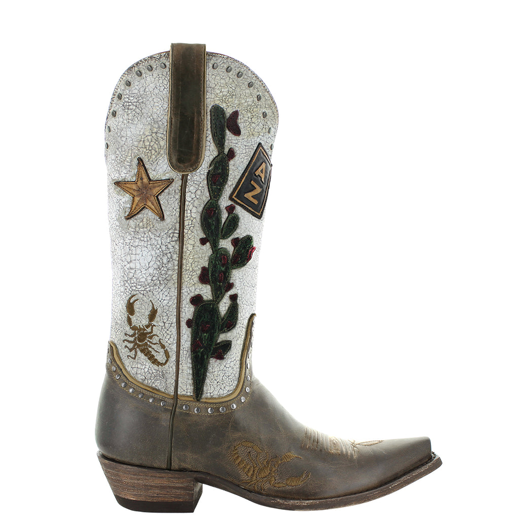 A tall brown leather boot with detailed silver embellishments, including stars and what appears to be a cactus design, on a white background.