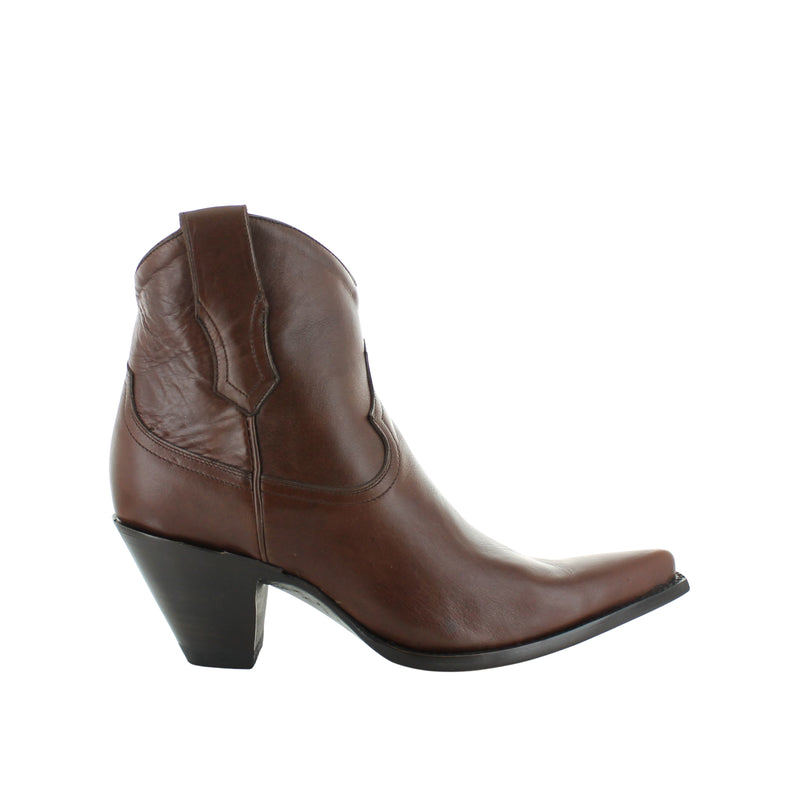 A women's boot with a high heel and a pointed toe.